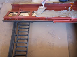 Wedge the tiles in position and plaster in - Antique Fireplace Co fitting instructions